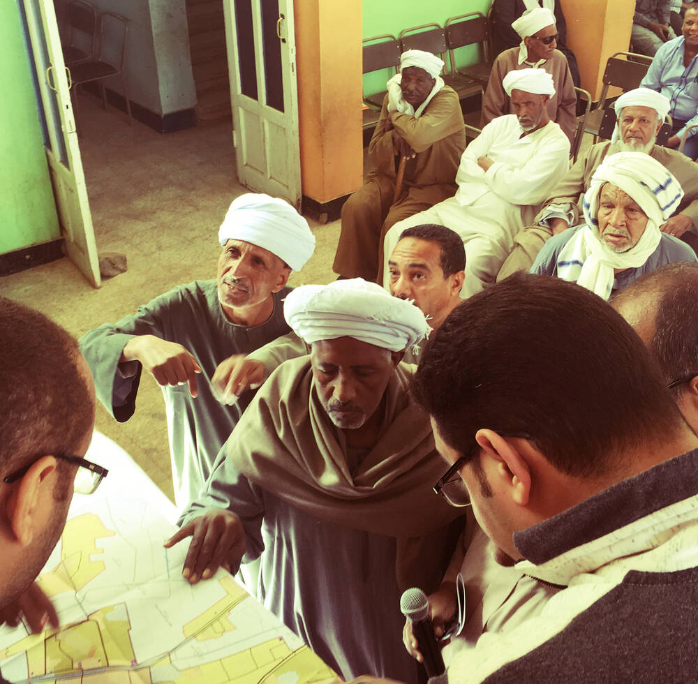 Supporting community participation on public hearing session for strategic plan at Aswan